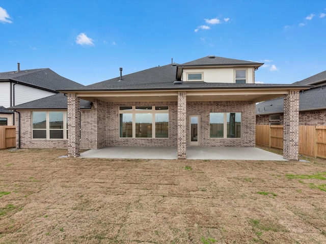 back of property featuring a patio