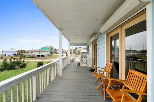 4406 Pabst Rd, Galveston, TX 77554 - wooden deck featuring a residential view