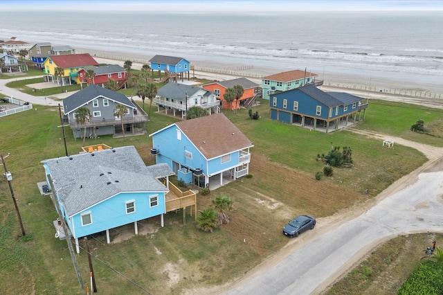 bird's eye view with a beach view and a water view