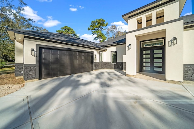 view of front of home with a garage