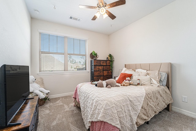 bedroom featuring ceiling fan, lofted ceiling, and light colored carpet