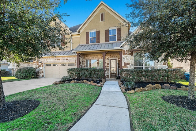 view of front facade with a front yard and a garage