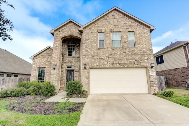 front of property with a garage