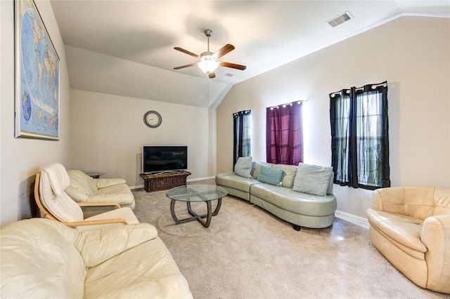 living room with light carpet, ceiling fan, and vaulted ceiling