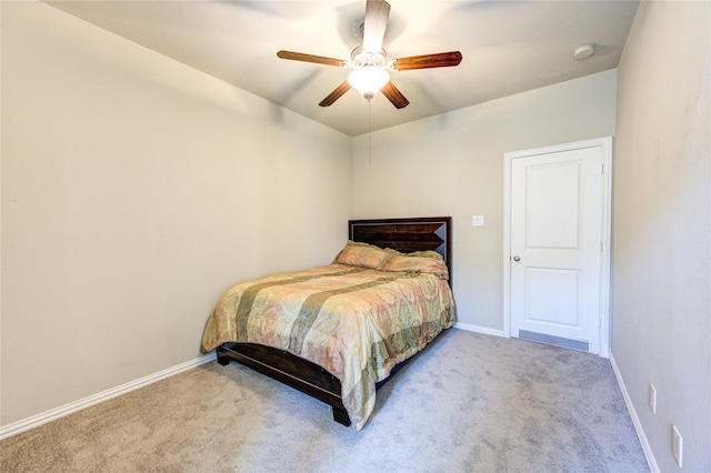 bedroom with light carpet and ceiling fan