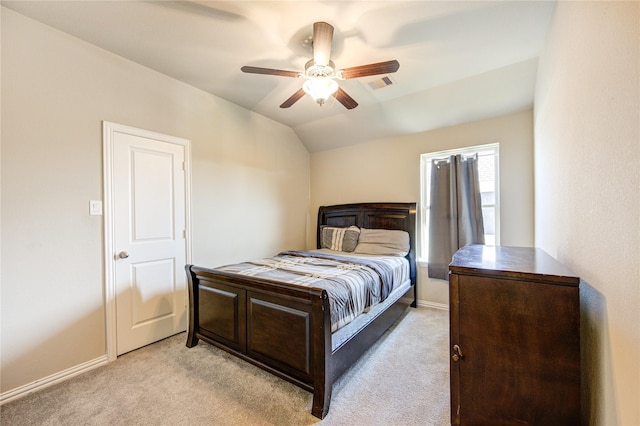 carpeted bedroom featuring ceiling fan and lofted ceiling