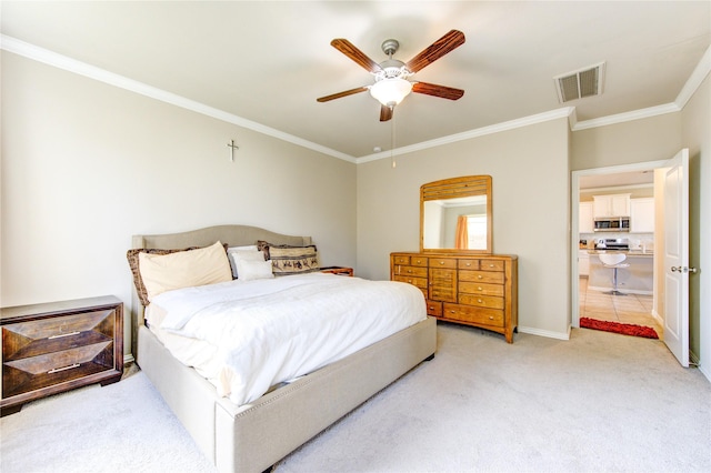 carpeted bedroom with ceiling fan and ornamental molding