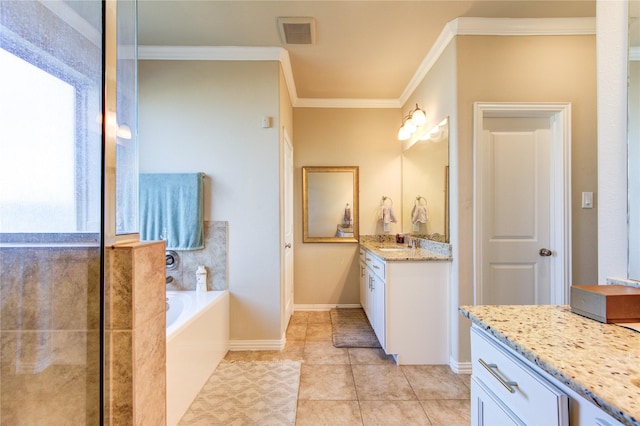 bathroom featuring tile patterned flooring, vanity, a bathtub, and crown molding