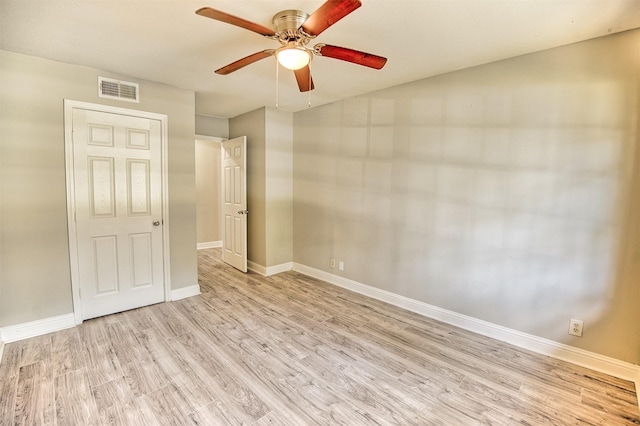 unfurnished bedroom featuring ceiling fan and light hardwood / wood-style floors