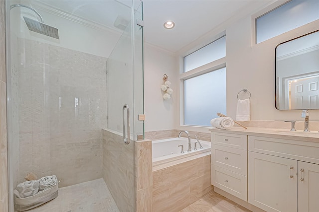 bathroom with separate shower and tub, vanity, and crown molding