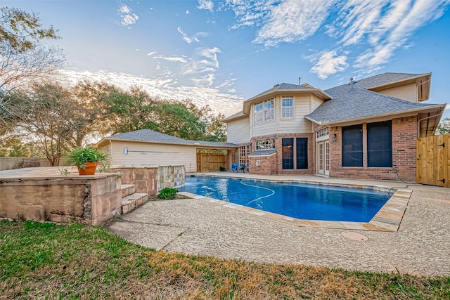 view of swimming pool featuring a patio