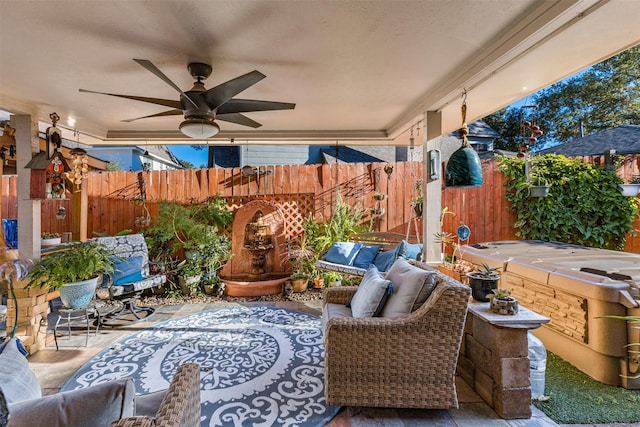 view of patio with ceiling fan and an outdoor hangout area