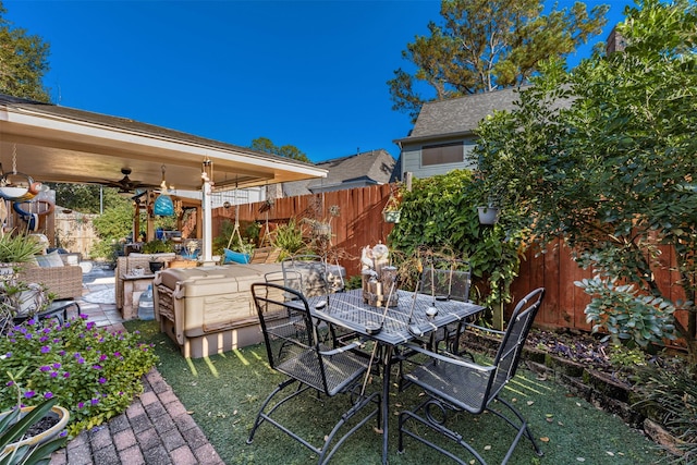 view of patio / terrace with ceiling fan and area for grilling