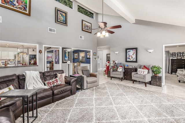 tiled living room with beamed ceiling, high vaulted ceiling, and ceiling fan