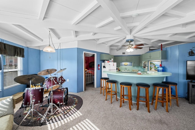 kitchen with light carpet, kitchen peninsula, ceiling fan, beam ceiling, and white refrigerator