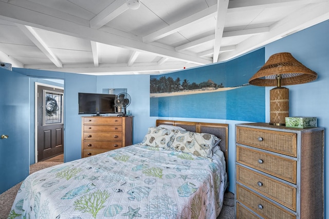 bedroom featuring beam ceiling