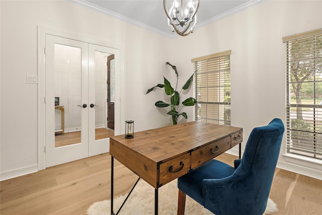 office area featuring a notable chandelier, light hardwood / wood-style flooring, french doors, and ornamental molding