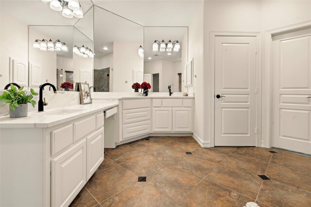 bathroom with vanity and an enclosed shower