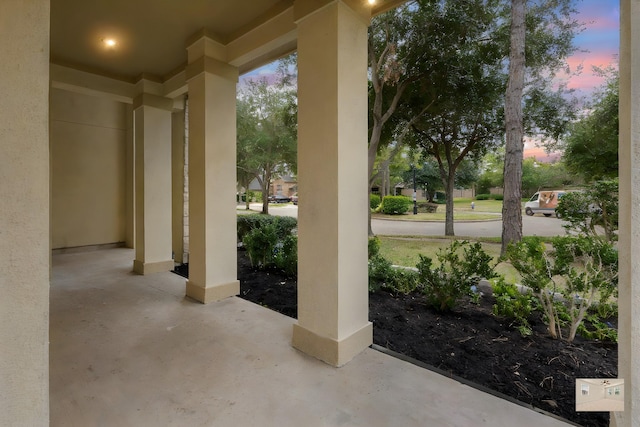 view of patio terrace at dusk