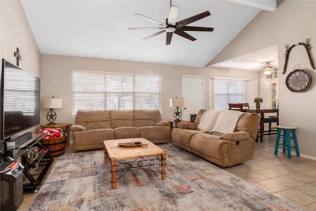 tiled living room with beamed ceiling, ceiling fan, and high vaulted ceiling