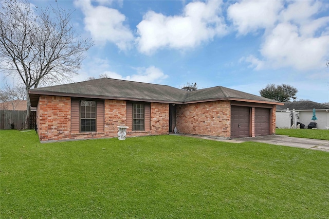 single story home with a garage and a front lawn