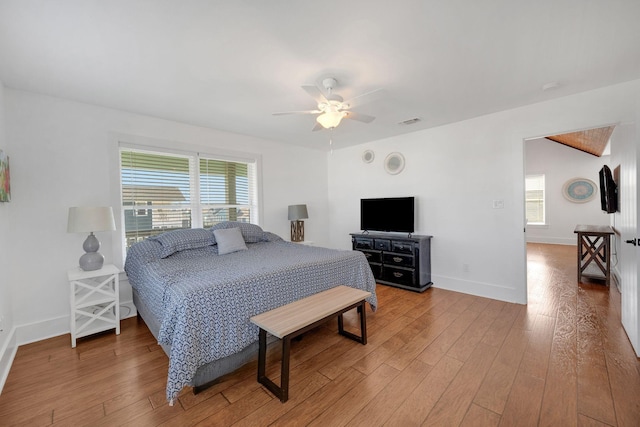 bedroom featuring ceiling fan and hardwood / wood-style floors