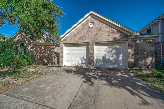 ranch-style home with a garage