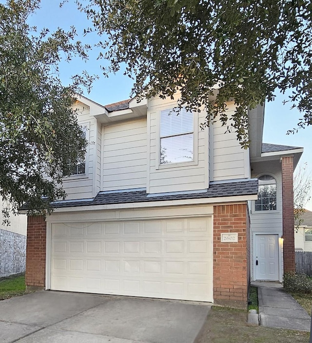 view of front of property featuring a garage