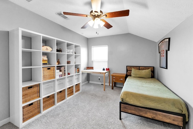 bedroom with light carpet, ceiling fan, and lofted ceiling