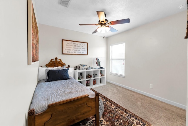 bedroom featuring ceiling fan and carpet floors