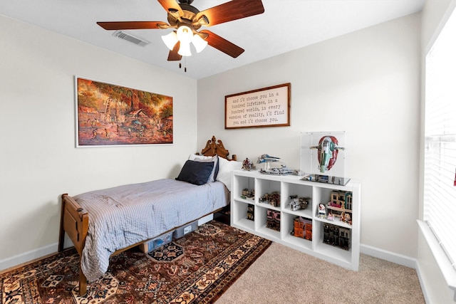 bedroom featuring ceiling fan and carpet flooring