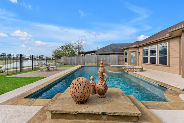 view of swimming pool with an in ground hot tub, a water view, and a patio