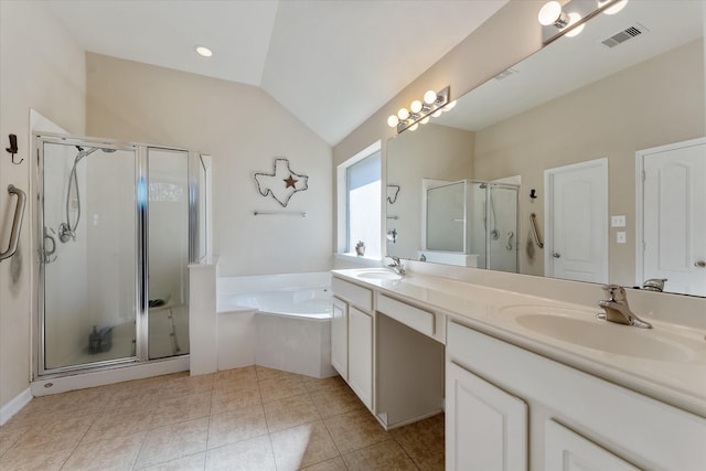 bathroom featuring plus walk in shower, vanity, and vaulted ceiling