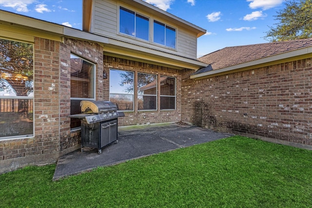 view of patio featuring a grill