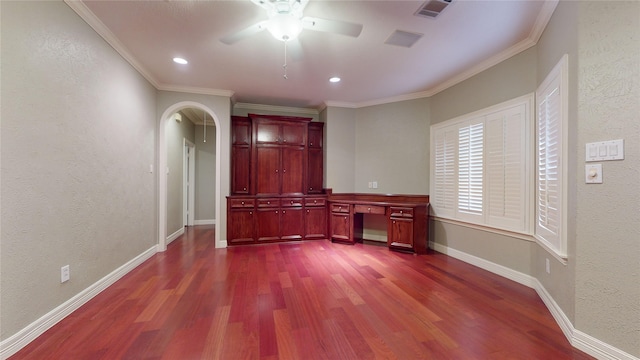 interior space with dark hardwood / wood-style floors, ceiling fan, and crown molding