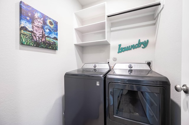 washroom featuring independent washer and dryer