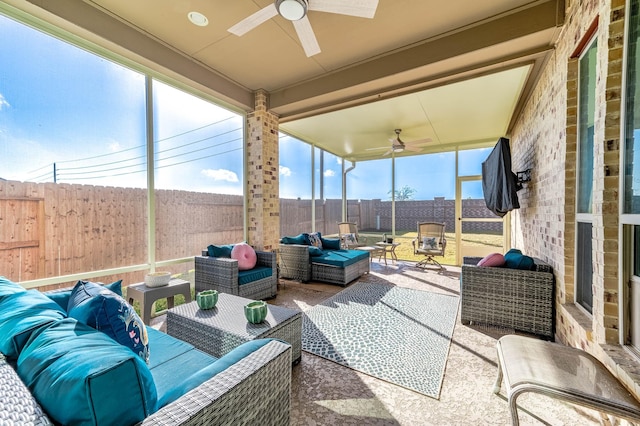 view of patio / terrace featuring ceiling fan and an outdoor living space