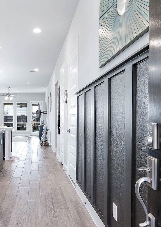 hallway featuring light hardwood / wood-style flooring