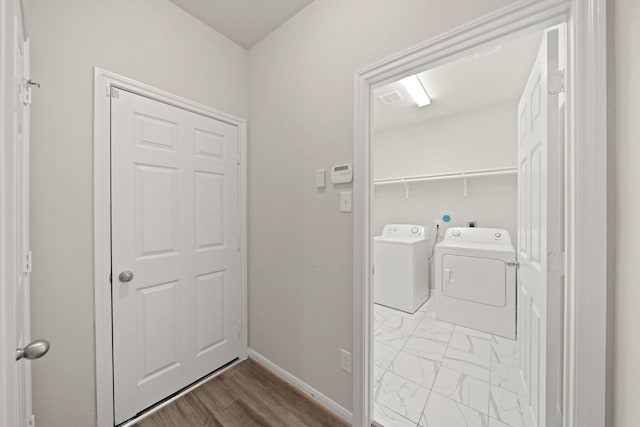 laundry room with washer and clothes dryer