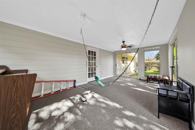 view of patio featuring ceiling fan