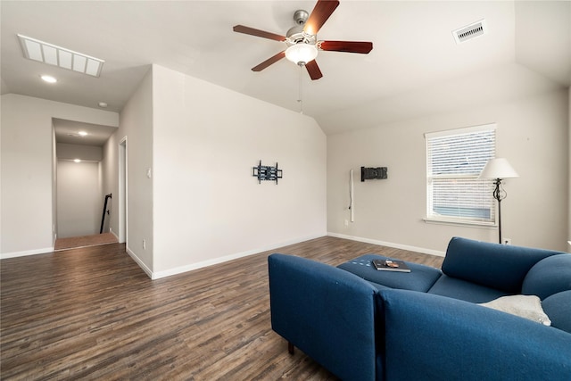 living room with lofted ceiling, ceiling fan, and dark hardwood / wood-style floors