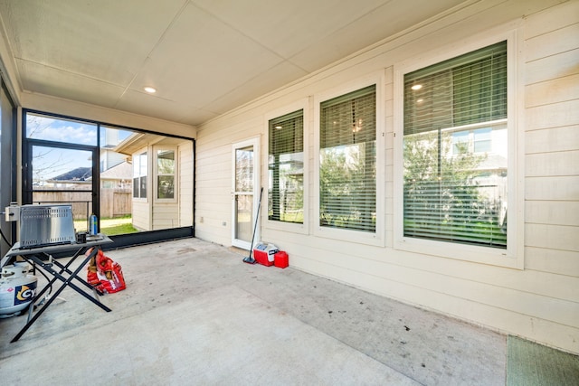 unfurnished sunroom with a healthy amount of sunlight