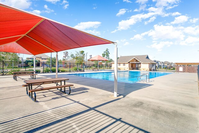 view of pool featuring a patio area