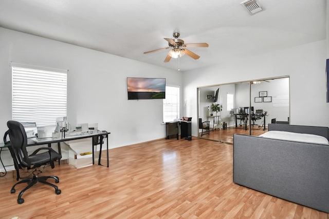 office featuring wood-type flooring and ceiling fan