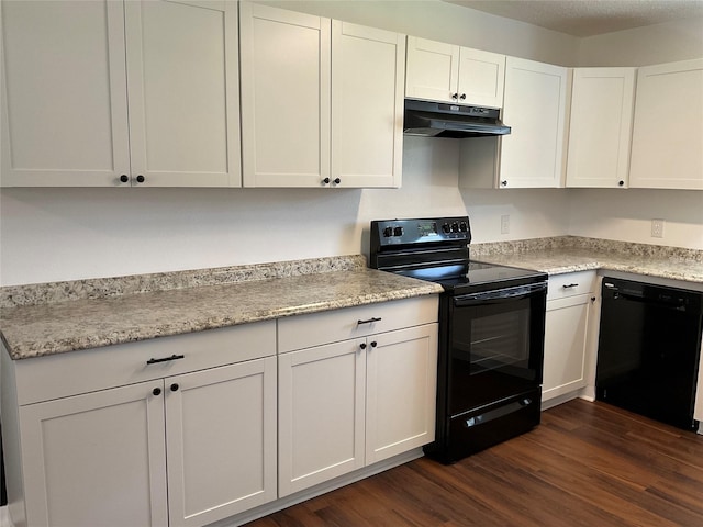 kitchen featuring light stone counters, white cabinets, dark hardwood / wood-style flooring, and black appliances