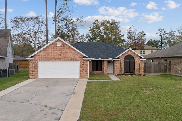 single story home with cooling unit, a garage, and a front yard