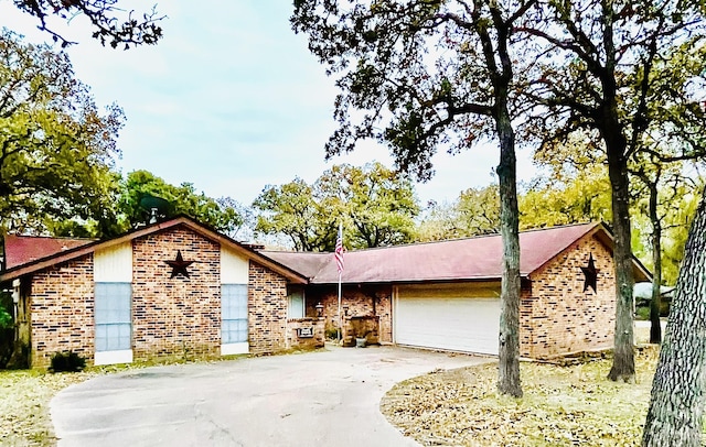 single story home featuring a garage