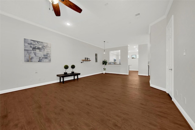 unfurnished living room with ceiling fan, dark hardwood / wood-style floors, and ornamental molding