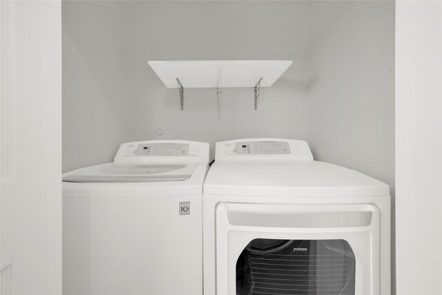 laundry area featuring independent washer and dryer