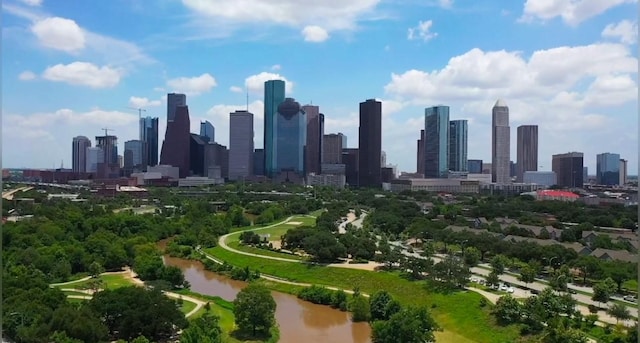 property's view of city with a water view